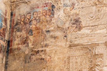 Ancient Roman art covering Egyptian hieroglyphics in Luxor Temple in Luxor, Egypt - 753042238