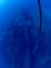 scuba divers exploring wrecks underwater wreck diving
