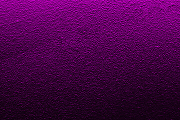 purple neon light on cement wall.