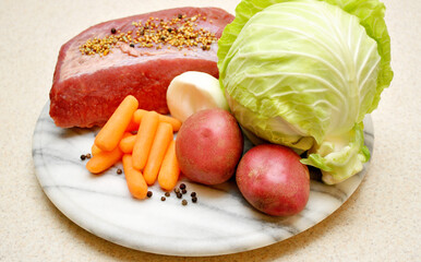 Corned beef and vegetables ingredients for a delicious meal.