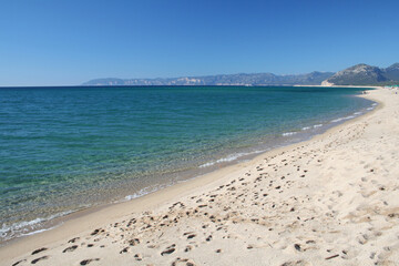 Turquoise water in the beautiful Orosei Beach in Sardinia, Italy