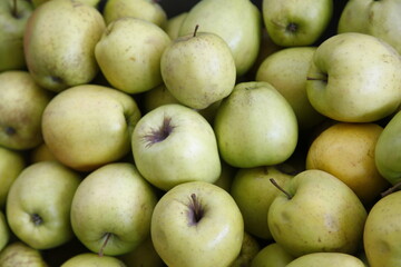 green apples in a market
