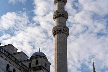 A tall tower with a dome on top of it