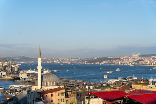 A city view with a large mosque in the background
