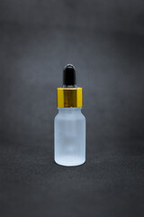 oil bottle for body and face on isolate on Gray Background