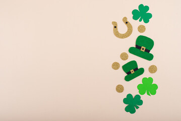 St. Patrick's Day concept with leprechaun hat, gold coins and horseshoe
