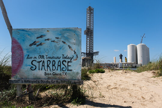 SpaceX Starbase with handpainted sign on beach under a sunny sky in Boca Chica, Texas on February 25, 2024.