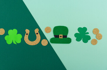 St. Patrick's Day concept with leprechaun hat, gold coins and horseshoe