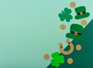 St. Patrick's Day concept with leprechaun hat, gold coins and horseshoe