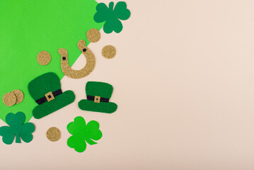 St. Patrick's Day concept with leprechaun hat, gold coins and horseshoe