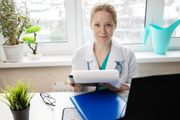 Health insurance form, physician verifying coverage, safeguarding patient well-being