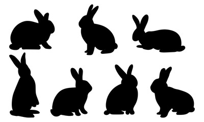 Silhouettes of easter bunnies isolated on a white background. Set of different rabbits silhouettes for design use.