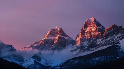 Rolgordijnen Majestic Sunrise Over Snow-Capped Mountains © Maksym