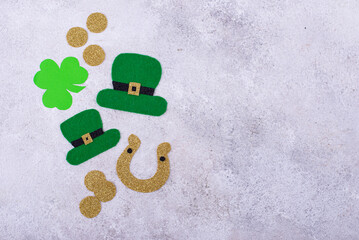 St. Patrick's Day concept with leprechaun hat, gold coins and horseshoe