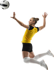 Dynamic full-length image of young competitive girl in yellow uniform, volleyball payer in motion...