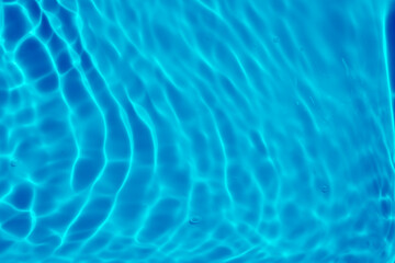 Abstract transparent water shadow surface texture natural ripple on blue background