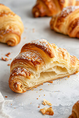 Freshly Baked Croissant with Powdered Sugar Dusting
