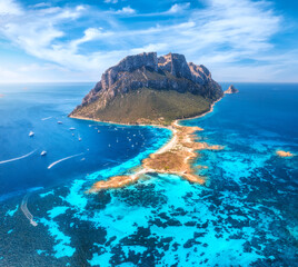 Aerial view of sandy beach on amazing Tavolara island in Sardinia, Italy. Top view of clear blue...