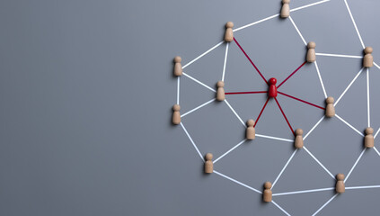 Connecting people, partnership, social media networks concept on gray background using wood block...