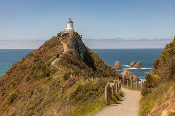 The 10-metre Nugget Point lighthouse, off the Southern Scenic Route, was first lit in 1870....