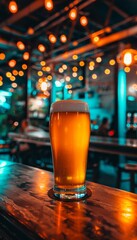 Frothy beer glass closeup with warm bokeh lights background, perfect for text placement