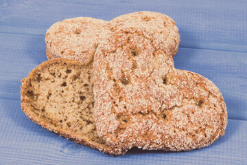Fresh homemade wholegrain bread in shape of heart for breakfast