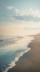 A panoramic view of a sandy beach at sunrise with a soft, pastel sky, perfect for relaxation-themed...