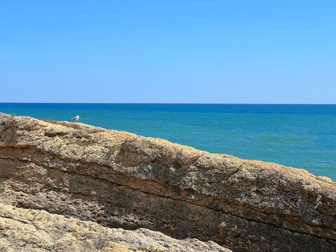Rocky coast, sea, sky.