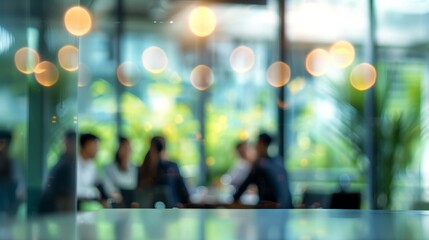 A blurred office meeting with business people sitting around a table, engaged in a discussion or training session. Blurred office and workplace background. 