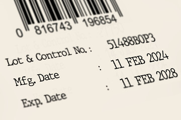 Fototapeta premium Details of expiry date and manufacturing date on product label. DOF.