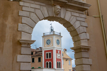 balbis arch with town clock tower next to Tito square in Rovinj Croatia
