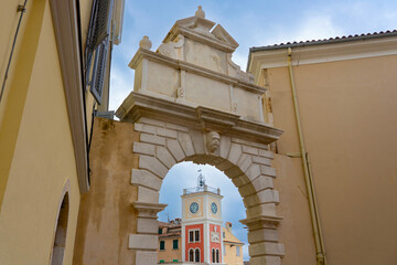 balbis arch with town clock tower next to Tito square in Rovinj Croatia