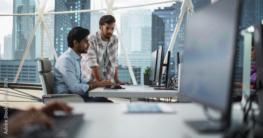 Fototapete Two Indian Colleagues Having a Conversation While Busy Working on a Business Project. Software Engineer Talking with Project Manager During a Meeting. Teamwork in a Modern Corporate Office