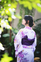 portrait woman with yukata dress in the garden