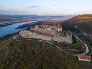 Fototapeta premium Aerial photos of the Visegrad Castle in Hungary on a sunny winter day. Drone Photo, Visegrádi Fellegvár, Visegrad Castle, Duna, Danube, Sunny Winter Day