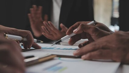 Business team collaboration discussing working analyzing with financial data and marketing growth report graph in team, presentation and brainstorming to strategy planning making profit of company.