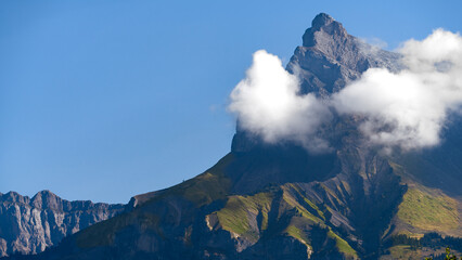 Fototapeta premium clouds over the mountains Swiss Alps