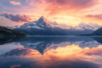 Cercles muraux Réflexion A majestic mountain landscape at sunset, snow-capped peaks, a crystal-clear lake reflecting the vibrant sky, serene nature. Resplendent.