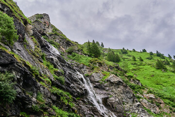 The Capra Waterfall, also known as the Iezerului Waterfall in the Fagaras Mountains