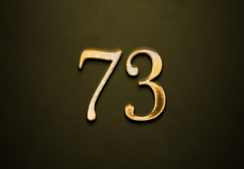 Old gold effect of 73 number with 3D glossy style Mockup.	
