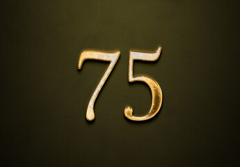 Naklejka premium Old gold effect of 75 number with 3D glossy style Mockup. 