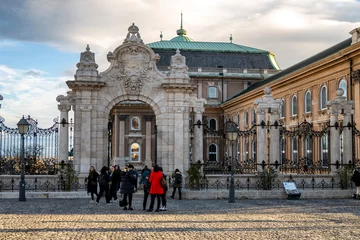 Tuinposter Beautiful Buda castle and stone gates, on of the most known Budapest landmarks, rising on the hill above the city, visited by many tourists daily © Miroslav Posavec
