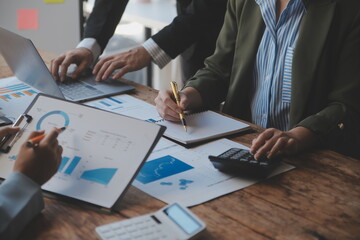 Co working conference, Business team meeting present, investor colleagues discussing new plan financial graph data on office table with laptop and digital tablet, Finance, accounting, investment.