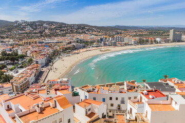 Aerial view over houses and the beach in Peniscola, Spain