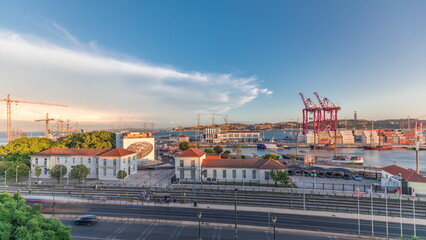 Panorama showing aerial view of the port of the city of Lisbon timelapse with the 25 of April Bridge on the background.