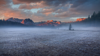 Beauttiful mountain range panorama at frosty dawn