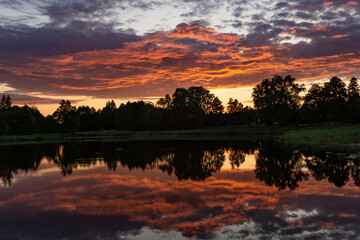 Beautiful sunset by the lonely lake.
