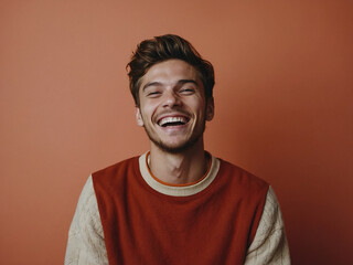 Funny smiling funny young man laughs at the camera, photo studio, Joy Unleashed, The Infectious Laughter of a Dashing Young Man, Maroon background