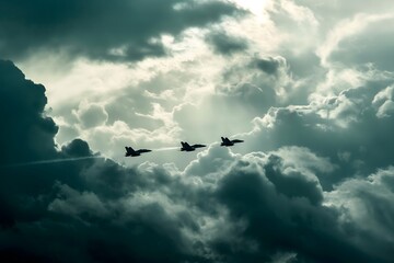 A formation of three fighter jets flying through a cloudy sky - obrazy, fototapety, plakaty