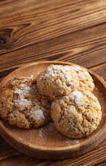 Homemade cereal cookies on a wooden plate
